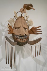 Carved and painted wood Yupik dance mask representing the Keeper of the River’s Mouth