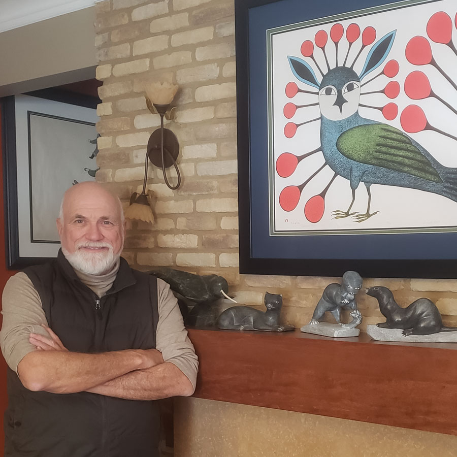 photo of IAS board member Chris Rinner with artwork