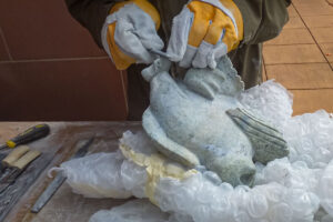 Pootoogook Qiatsuk, a widely exhibited, multi-dimensional artist who creates prints, sculpture, and jewelry at the 2014 Inuit Art Society Meeting in Indianapolis.