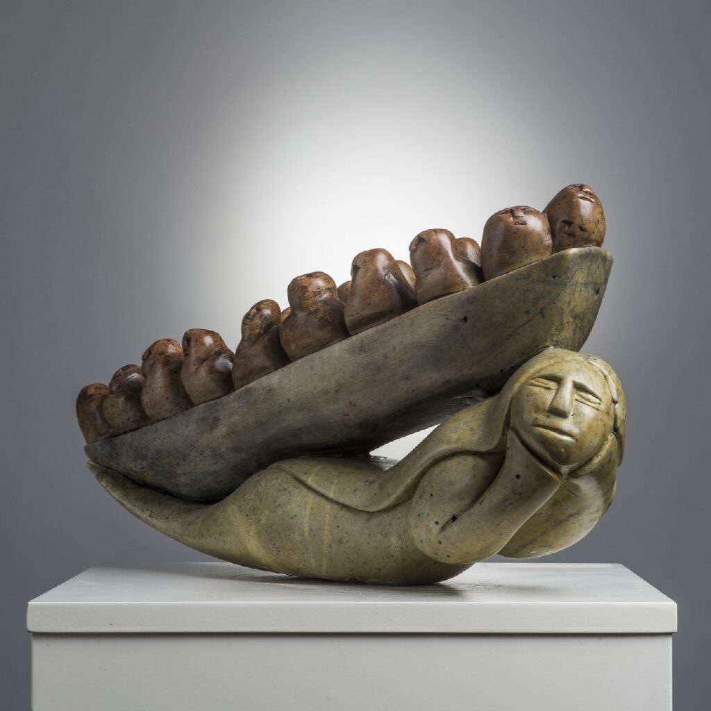 photo of a carving by by Abraham Anghik Ruben from an exhibit at Feheley Fine Arts