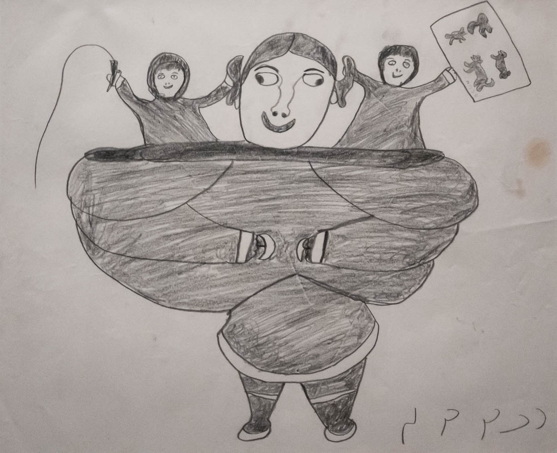 Photo of a monochrom drawing of an Inuit woman with two children in her hood, one of which is holding a piece of artwork.