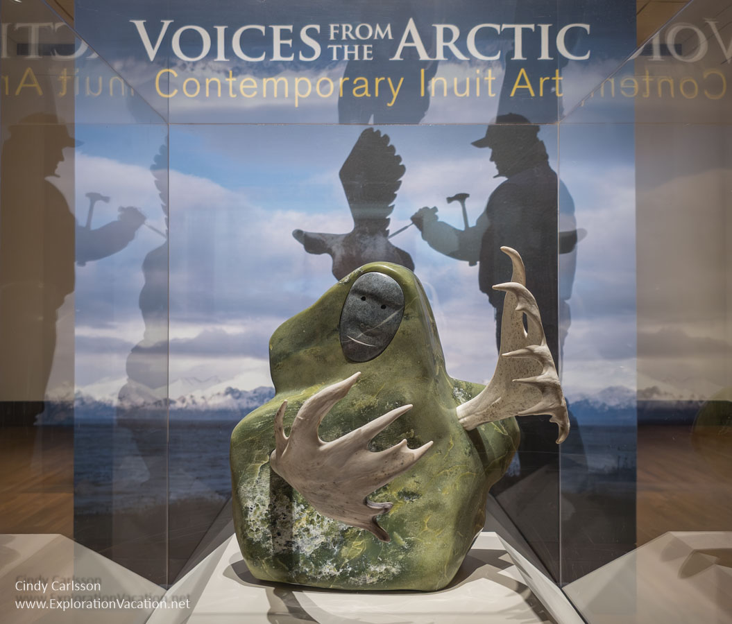 Photo of a sculpture by Mattusie Iyaituk by the Voices from the Arctic gallery entrance