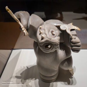 Photo of a stone sculpture of a monster by Michael Massie called "Koodlapoodlalook (Qalupalik) the Consequences of Disbelief" at the Eiteljorg in Indianapolis, Indiana