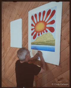 Michael Massie with one of his prints.